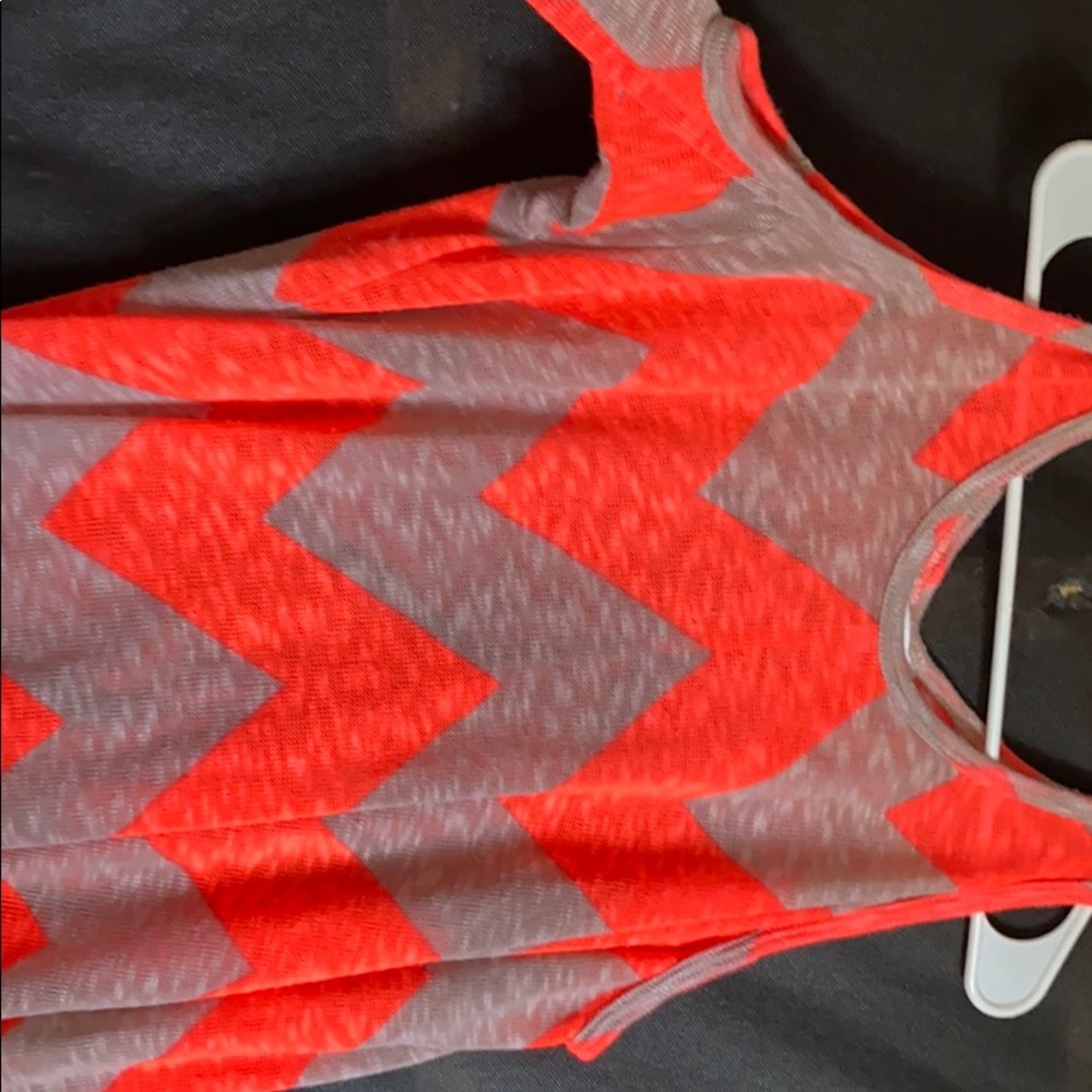 Sweater shows your shoulders pink and grey